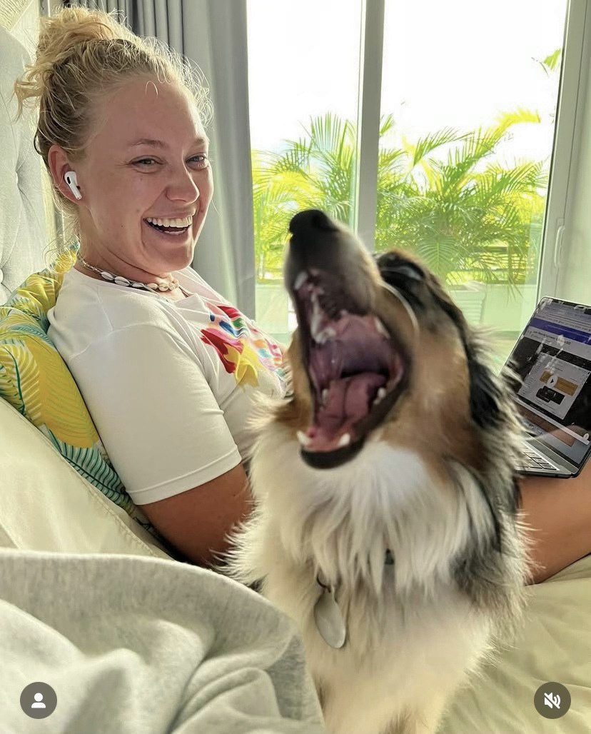 Mutt Maven laughing with a happy collie